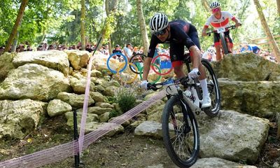 ‘It’s bigger than cycling’: Tom Pidcock defies puncture to claim Olympic gold