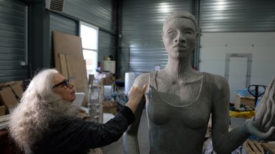 'Embracing the ideals of the Olympics': LA artist's powerful sculpture takes centre stage at Paris 2024