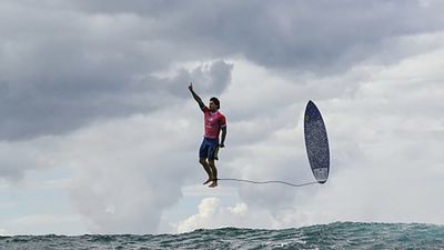 Epic Photo of Brazilian Surfer Celebrating Historic Score Defies Gravity