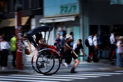 Japan cracks down on electric suitcase riders