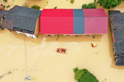 China reports 7 more deaths from torrential rains brought by tropical storm, raising toll to 22