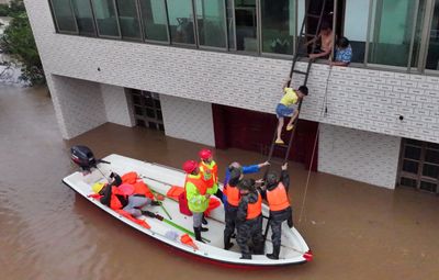 At least 22 dead as tail end of Typhoon Gaemi lashes China