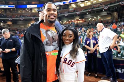 Simone Biles’ husband Jonathan Owens supports from the stands with her parents for women’s gymnastics team finals