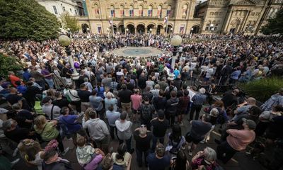 ‘Can’t help but cry’: hundreds pay tribute to Southport stabbing victims