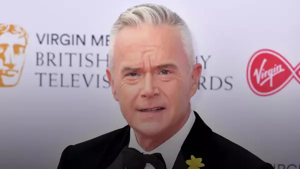 Huw Edwards 'splits from his TV producer wife and moves out of family home' ahead of court hearing