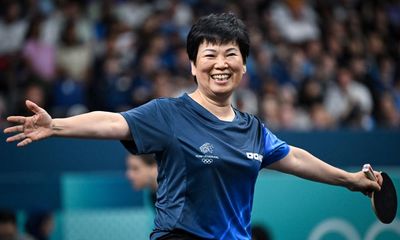 ‘Auntie’ Ni, 61, beams as she bows out to Olympic table tennis champion