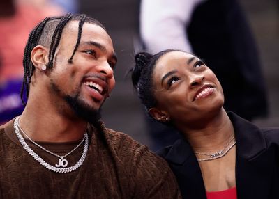 Simone Biles’ husband Jonathan Owens sparks outrage for wearing wife’s gold medal after Olympics win