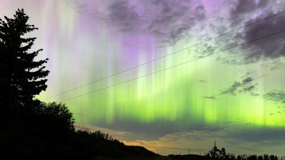 Northern lights delight as 'cannibal' solar storm triggers auroras across US and Canada (photos)