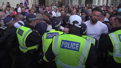 Over 100 arrests in London after police 'attacked' and flares thrown at Downing Street gates over Southport attack