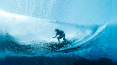 The ONLY Olympic photographer allowed in the water during surf events tells us what's in his camera bag