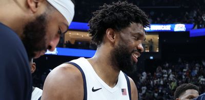 Joel Embiid seemed to be in good spirits on the bench despite his Olympic DNP against South Sudan