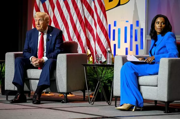 Trump repeats lies and attacks Kamala Harris’s racial identity at panel of Black journalists