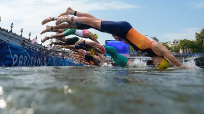 Olympic athletes dive into the Seine — days after it was deemed too contaminated with poop for safe swimming