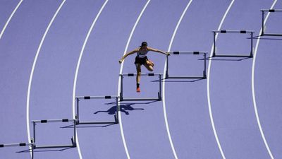 Coloring Outside the Lines: A Bold Purple Track Takes Center Stage at Paris Olympics