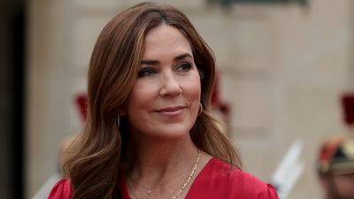 Queen Mary of Denmark glows in ravishing red blouse with the most flattering alternative to white jeans