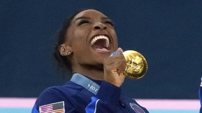 Simone Biles Has Sweet Exchange With Husband Jonathan Owens After All-Around Gold Medal