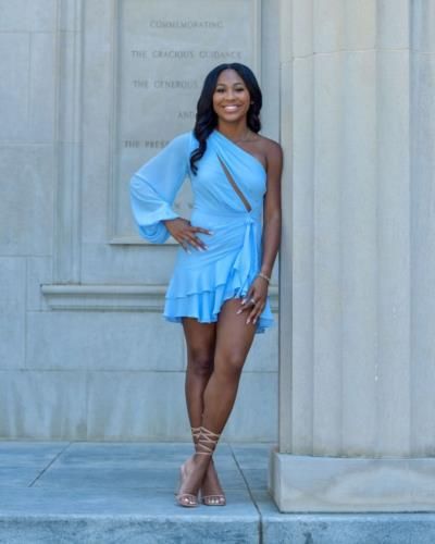 Jerome Bettis Radiates Elegance In Light Blue Dress Photo