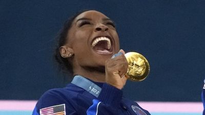 Simone Biles Was Wearing a Goat Necklace After Winning Gold