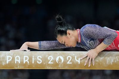 Sunisa Lee's long road back to the Olympics ended in a familiar spot: the medal stand