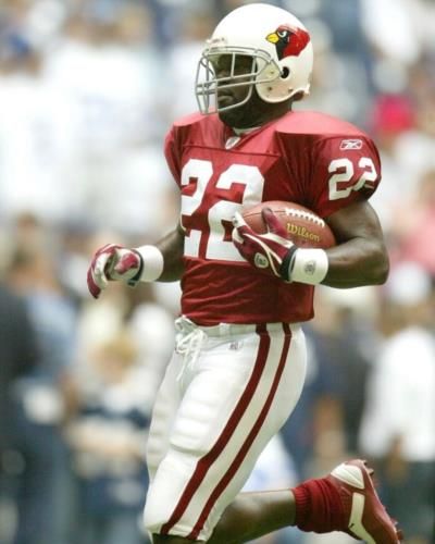 Emmitt Smith's Throwback Pictures Showcase Intensity And Skill On Field