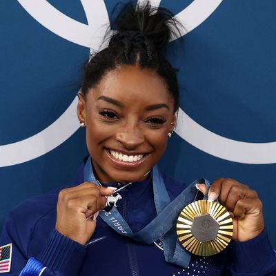 Simone Biles Pairs Her Historic Olympic Gold Medal With a Diamond Goat Necklace