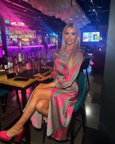 Ivanna Mcmahon Radiates Elegance And Charm In Stylish Setting