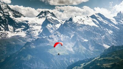 Watch amazing footage of two Swiss daredevils as they climb and paraglide their way to all 82 of the 4,000m peaks in the Alps