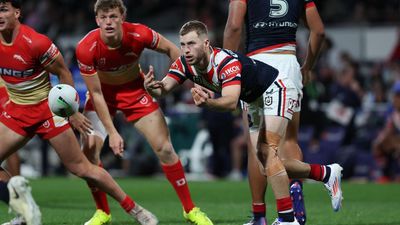 Walker magic gets Roosters win over Dolphins in classic