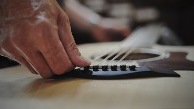 How to restring an acoustic guitar: step-by-step guidance from a professional guitar repairer
