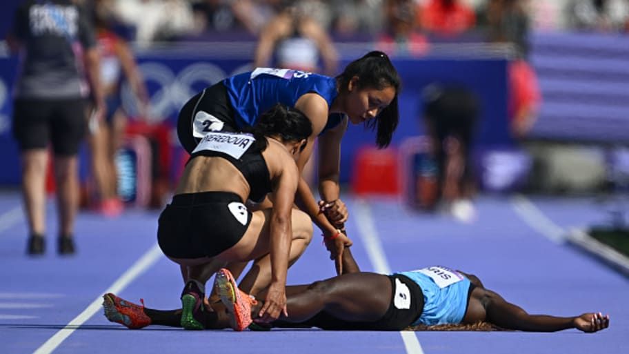 Olympic Sprinters Comfort Opponent Who Collapsed With…