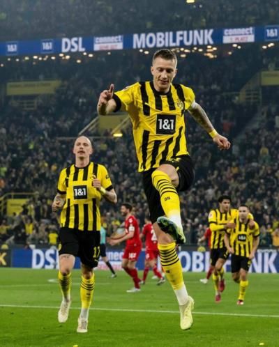 Marco Reus And Teammates Celebrate Victory With Joyful Expressions