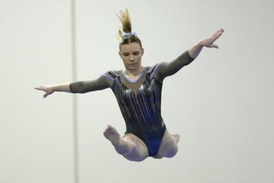 Jade Carey Impresses With Flawless Vault Performance At Competition.