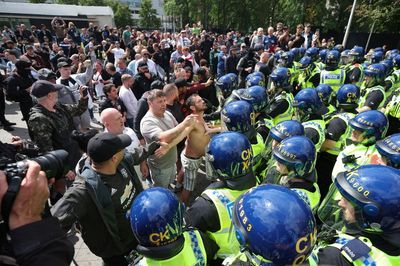 Far-right thugs in violent clashes with police as unrest spreads to cities across UK