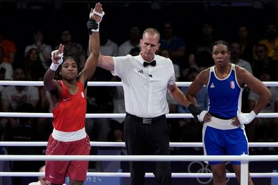 Boxer Cindy Ngamba is the refugee team's first athlete to clinch a medal at the Paris Olympics