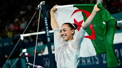 Algerian teen Nemour makes history with uneven bars Olympic gold