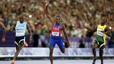 Noah Lyles Secures His First Gold Medal With 100m Win in Photo Finish