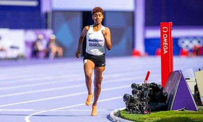 ‘This country saved me’: refugee Farida Abaroge relishes laps of honour at Stade de France