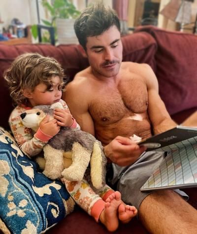 Zac Efron's Heartwarming Moment: Reading With A Young Companion