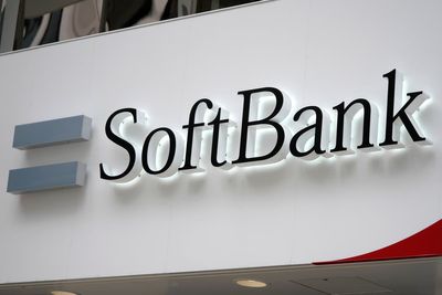 Japan's SoftBank reduces its investment losses with gains in Alibaba and other holdings