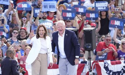 ‘We’re not going back’: thousands rally for Harris and Walz in Wisconsin and Michigan