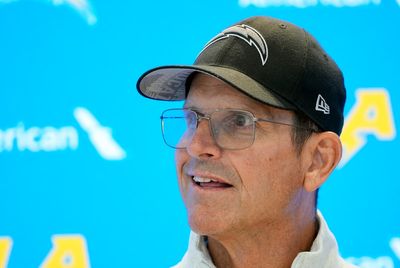 NCAA hands former Michigan coach Jim Harbaugh a 4-year show cause order for recruiting violations