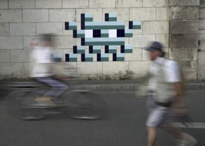 French Street Artist 'Invader' Celebrates Olympics In Paris