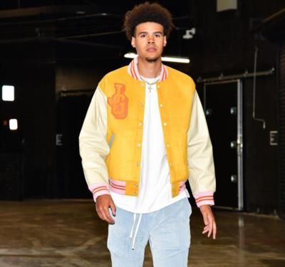 Cameron Johnson's Effortlessly Stylish Yellow Jacket Ensemble