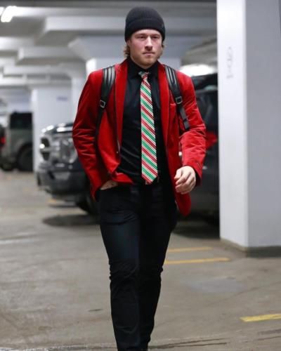 Brock Boeser's Stylish Red Blazer And Black Ensemble