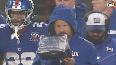 NFL Fans Loved Brian Daboll's Creative Way to Keep His Clipboard Out of the Rain