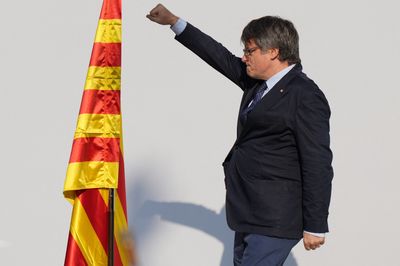 Ex-Catalan separatist leader Puigdemont leaves Spain after avoiding arrest