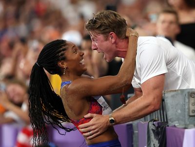 Tara Davis-Woodhall and her husband, Hunter, gleefully celebrating her Olympic gold medal is pure joy