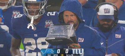 Brian Daboll explains why he used a plastic clipboard tent to protect his play sheet in the rain