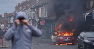 Two people jailed for stirring up racial hatred over England riots