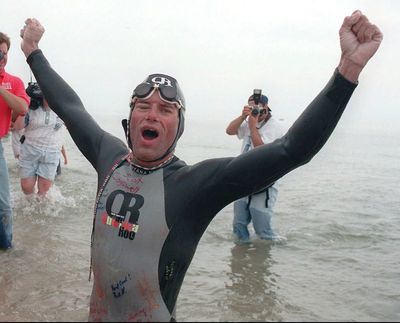 Marathon swimmer ends his quest to cross Lake Michigan after two days